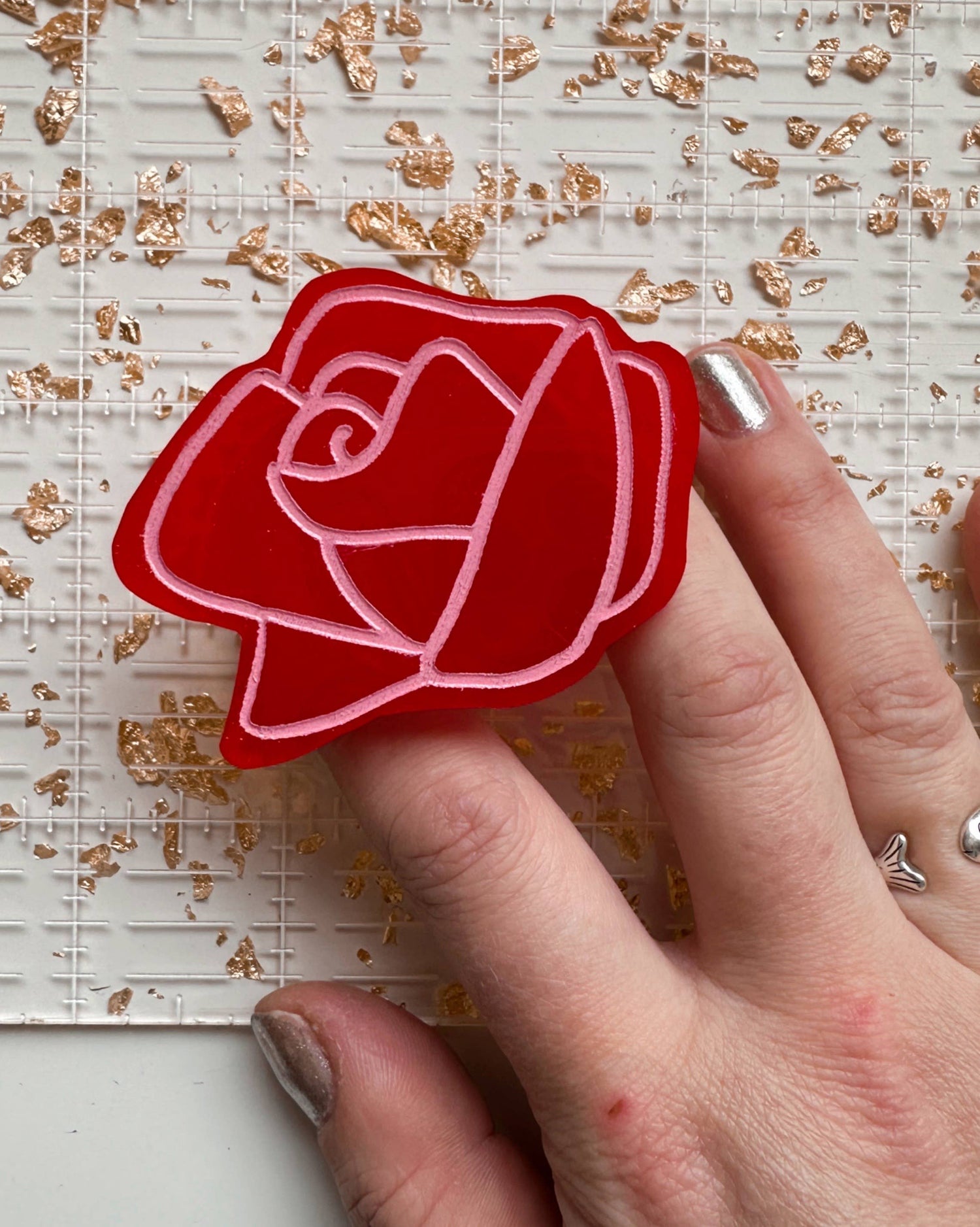 Rose pop-up ruler handle
